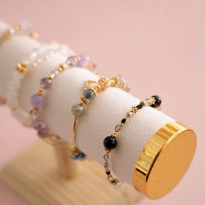 détails du bout doré du porte bracelet