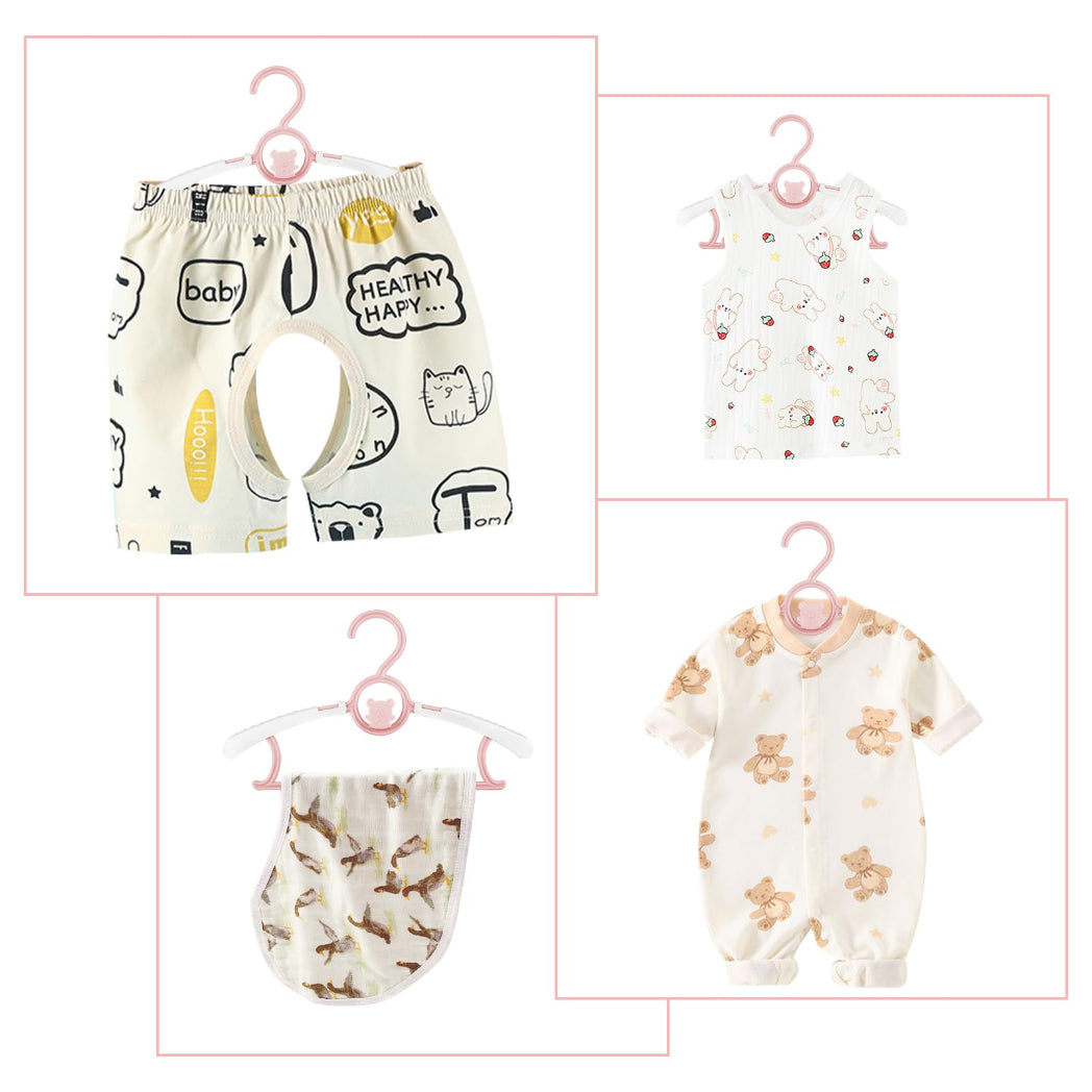 plusieurs vêtements bébé sur cintre enfant évolutif réglable rose