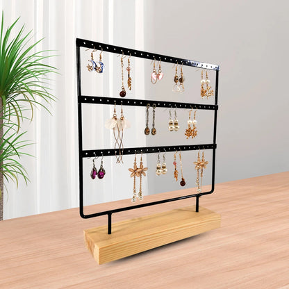 porte boucle d'oreille noir